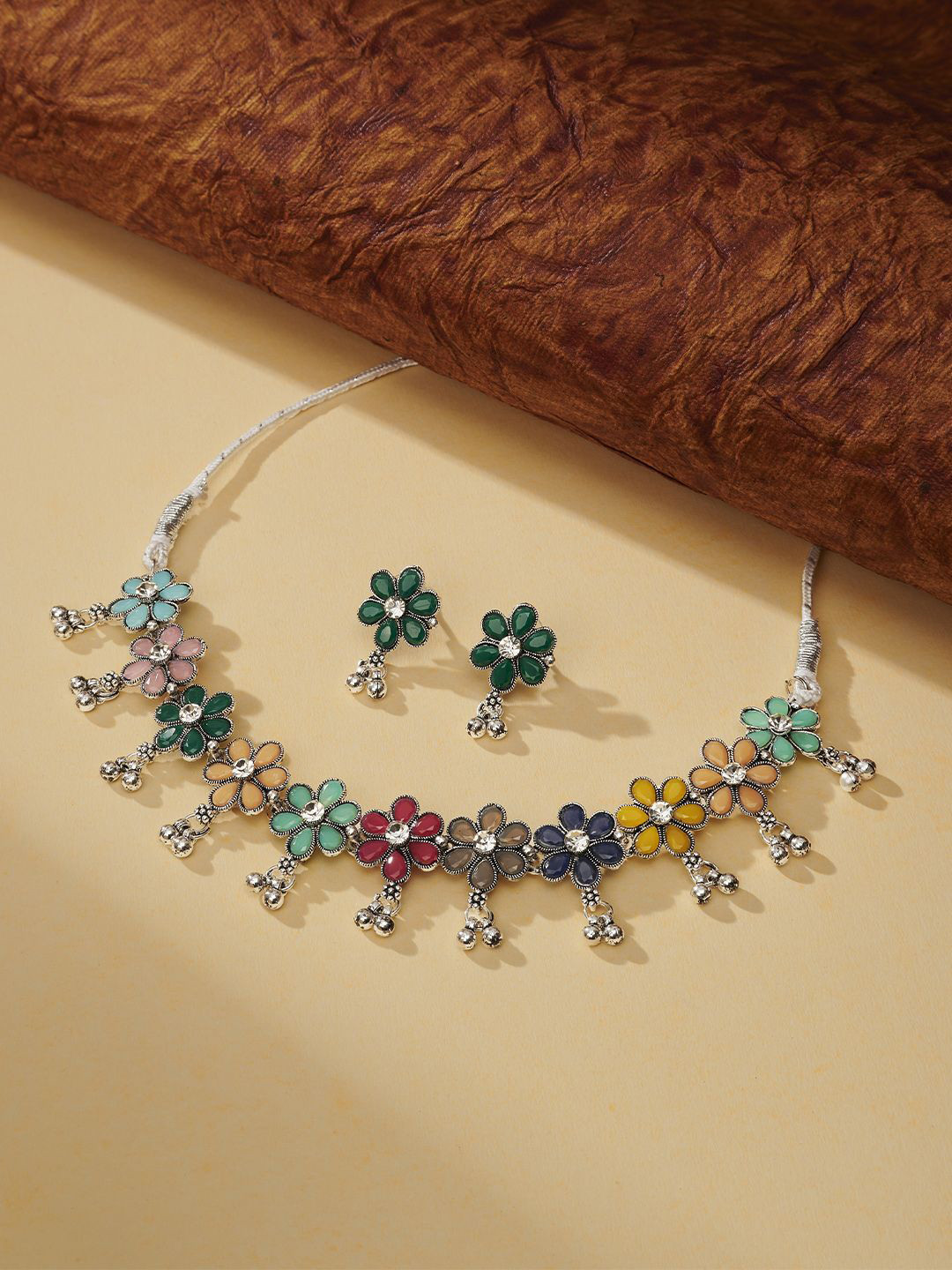 TEEJH Women Silver-Plated Stone Studded Oxidised Jewellery Set
TEEJH Women Silver-Plated Stone Studded Oxidised Jewellery Set