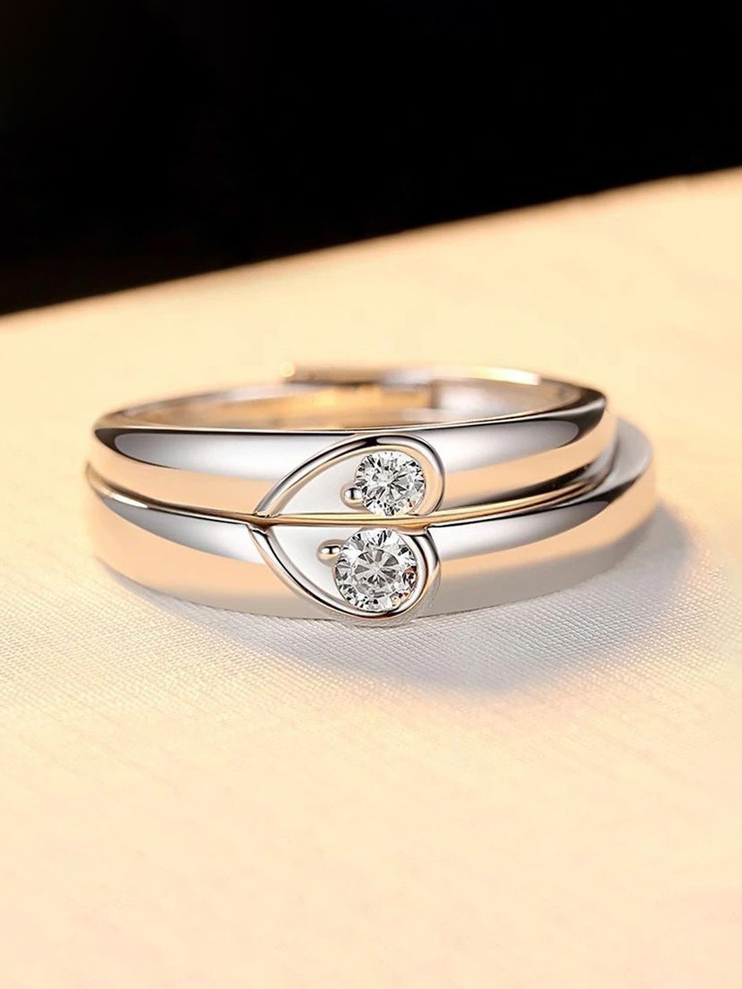 Jewels Galaxy Valentine's Set Of 2 Silver-Plated CZ Studded Adjustable Couple Finger Rings
Jewels Galaxy Valentine's Set Of 2 Silver-Plated CZ Studded Adjustable Couple Finger Rings
