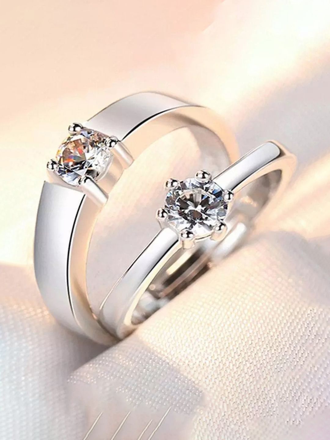 Jewels Galaxy Valentine's Set Of 2 Silver-Plated CZ Studded Adjustable Couple Finger Rings
Jewels Galaxy Valentine's Set Of 2 Silver-Plated CZ Studded Adjustable Couple Finger Rings