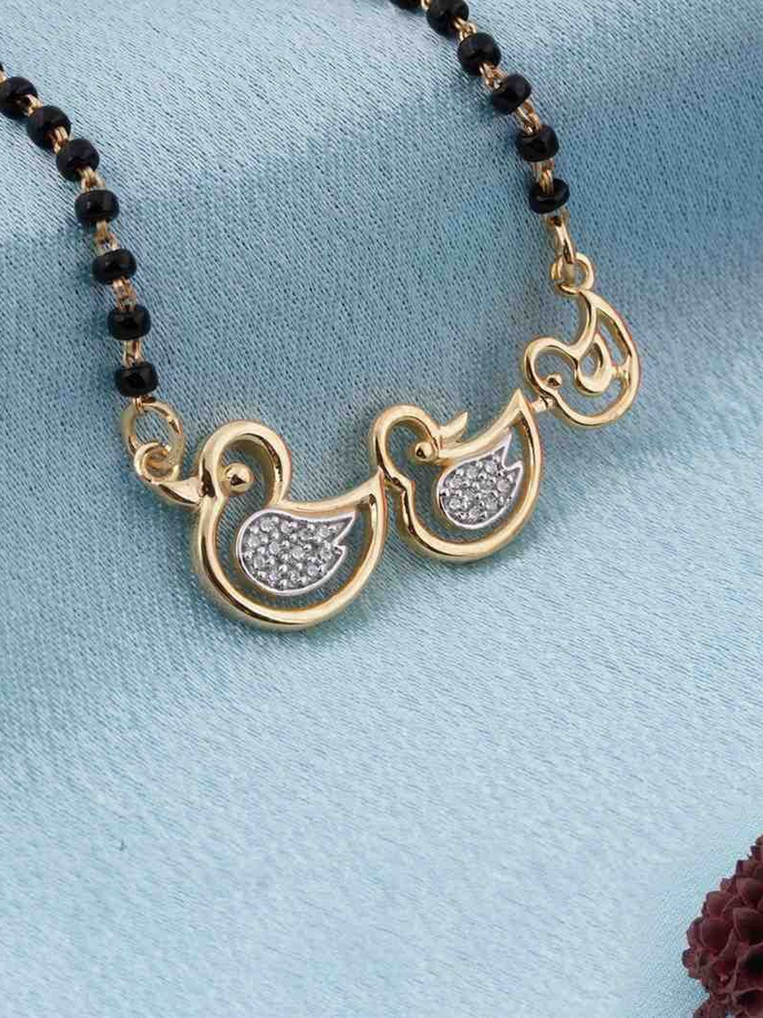 Zalkari 925 Sterling Silver Gold-Plated Stone Studded & Beaded Mini Ducks Mangalsutra
Zalkari 925 Sterling Silver Gold-Plated Stone Studded & Beaded Mini Ducks Mangalsutra
