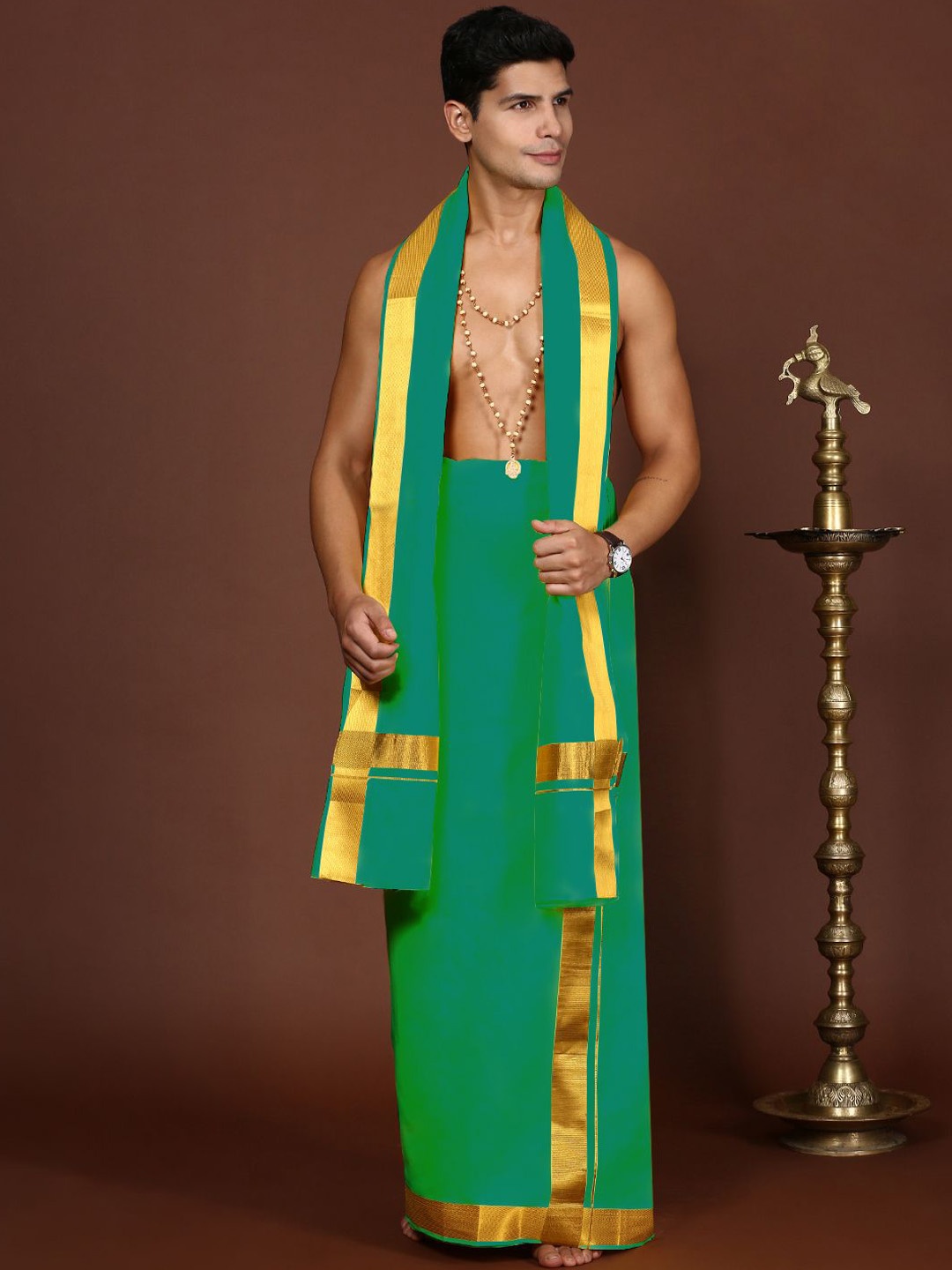 Devala Weavers Society Men Cotton Double Layer Green Dhotis & Angavastram Set with Zari Border
Devala Weavers Society Men Cotton Double Layer Green Dhotis & Angavastram Set with Zari Border