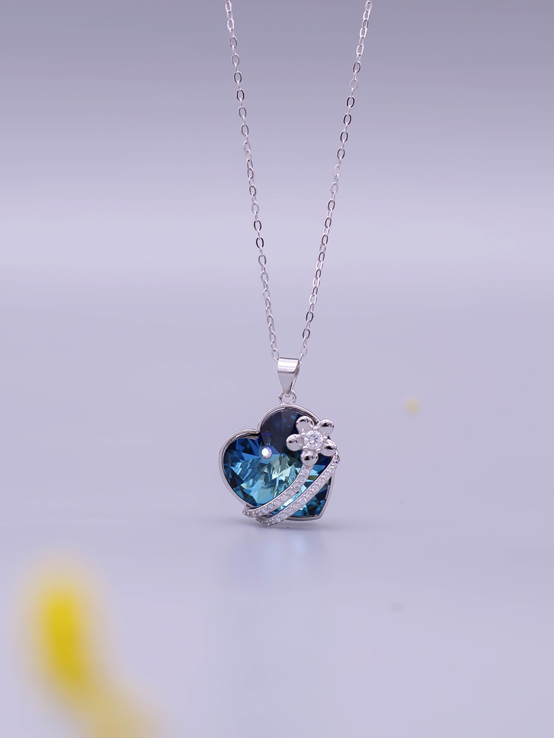 SILMORA Silver-Plated Cubic Zirconia Stone Studded Heart Shaped Pendant with Chain
SILMORA Silver-Plated Cubic Zirconia Stone Studded Heart Shaped Pendant with Chain