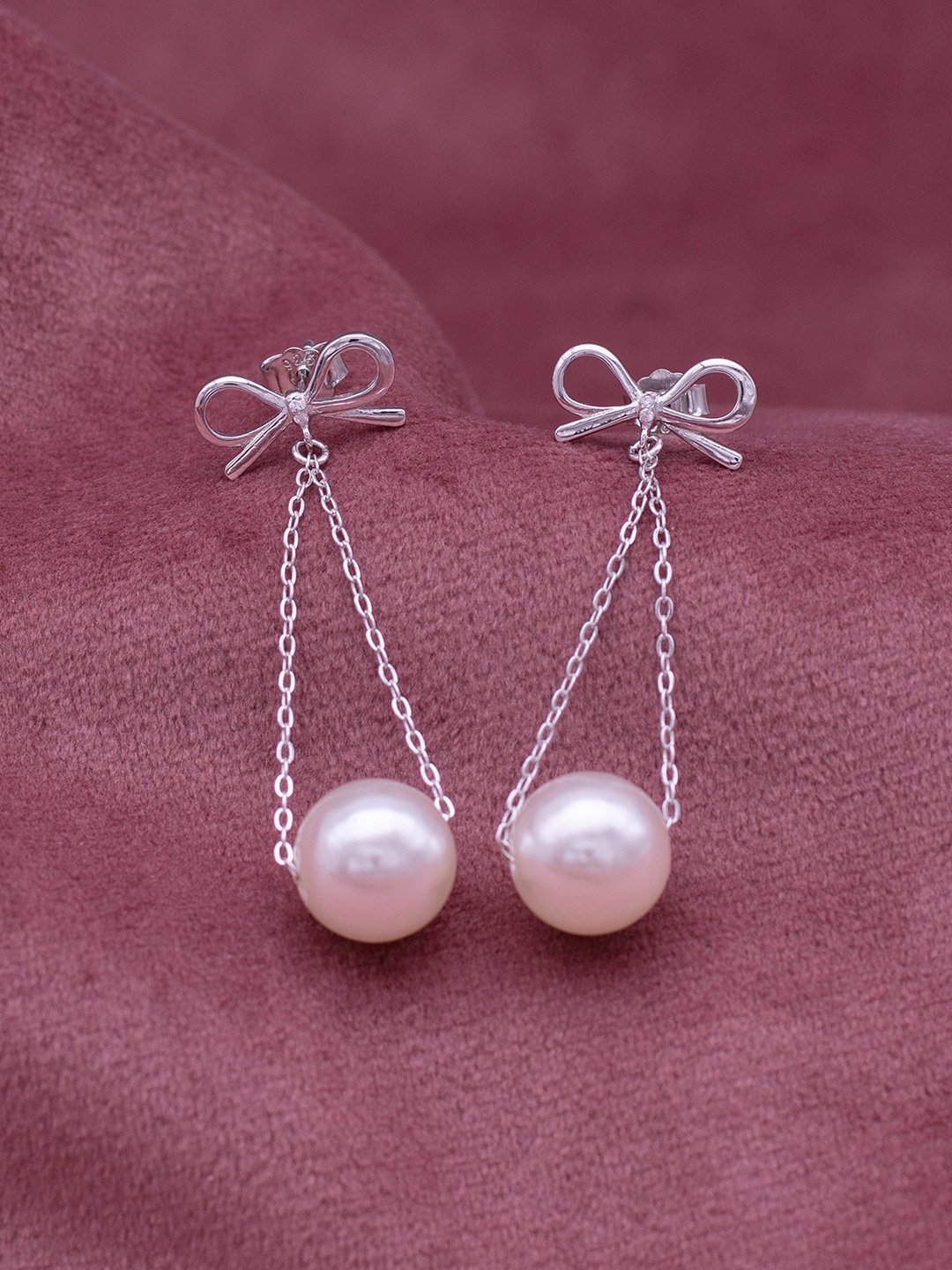 SILMORA Silver-Plated Pearl,Cubic Zirconia Stone Studded Contemporary Shaped Drop Earrings
SILMORA Silver-Plated Pearl,Cubic Zirconia Stone Studded Contemporary Shaped Drop Earrings