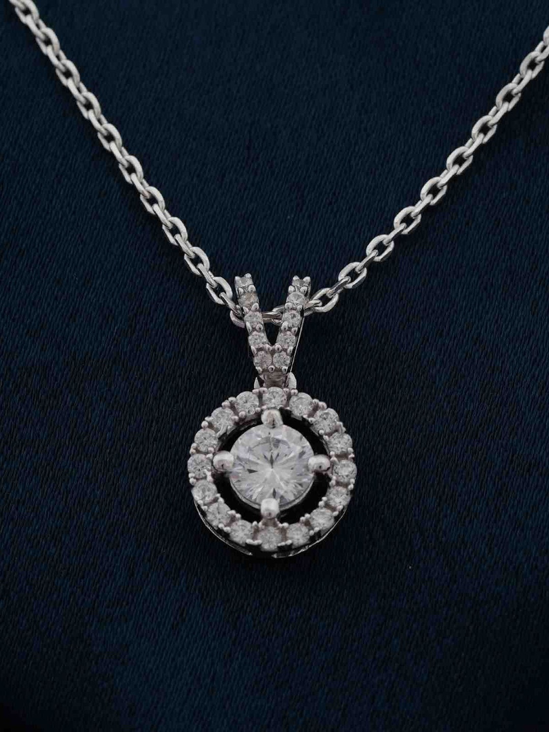 Zalkari Sterling Silver Rhodium-Plated CZ Studded Circular Shaped Graceful Compass Pendant
Zalkari Sterling Silver Rhodium-Plated CZ Studded Circular Shaped Graceful Compass Pendant