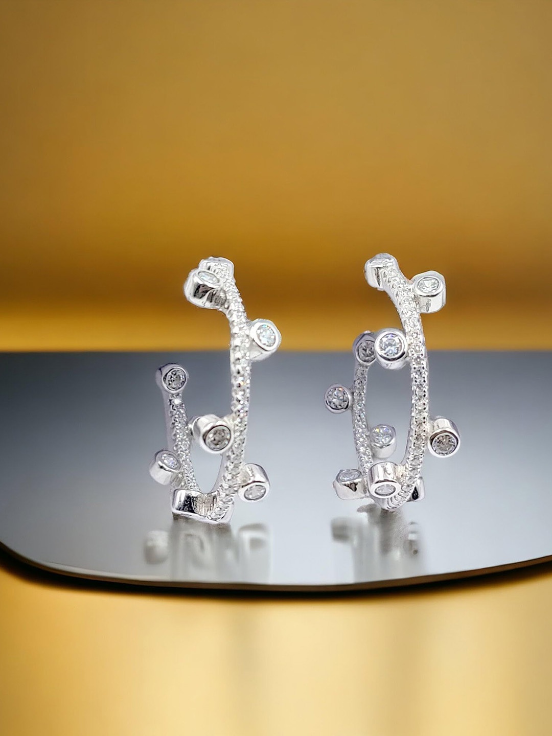AMONROO Rhodium-Plated 925 Sterling Silver Cubic Zirconia Studded Half Hoop Earrings
AMONROO Rhodium-Plated 925 Sterling Silver Cubic Zirconia Studded Half Hoop Earrings
