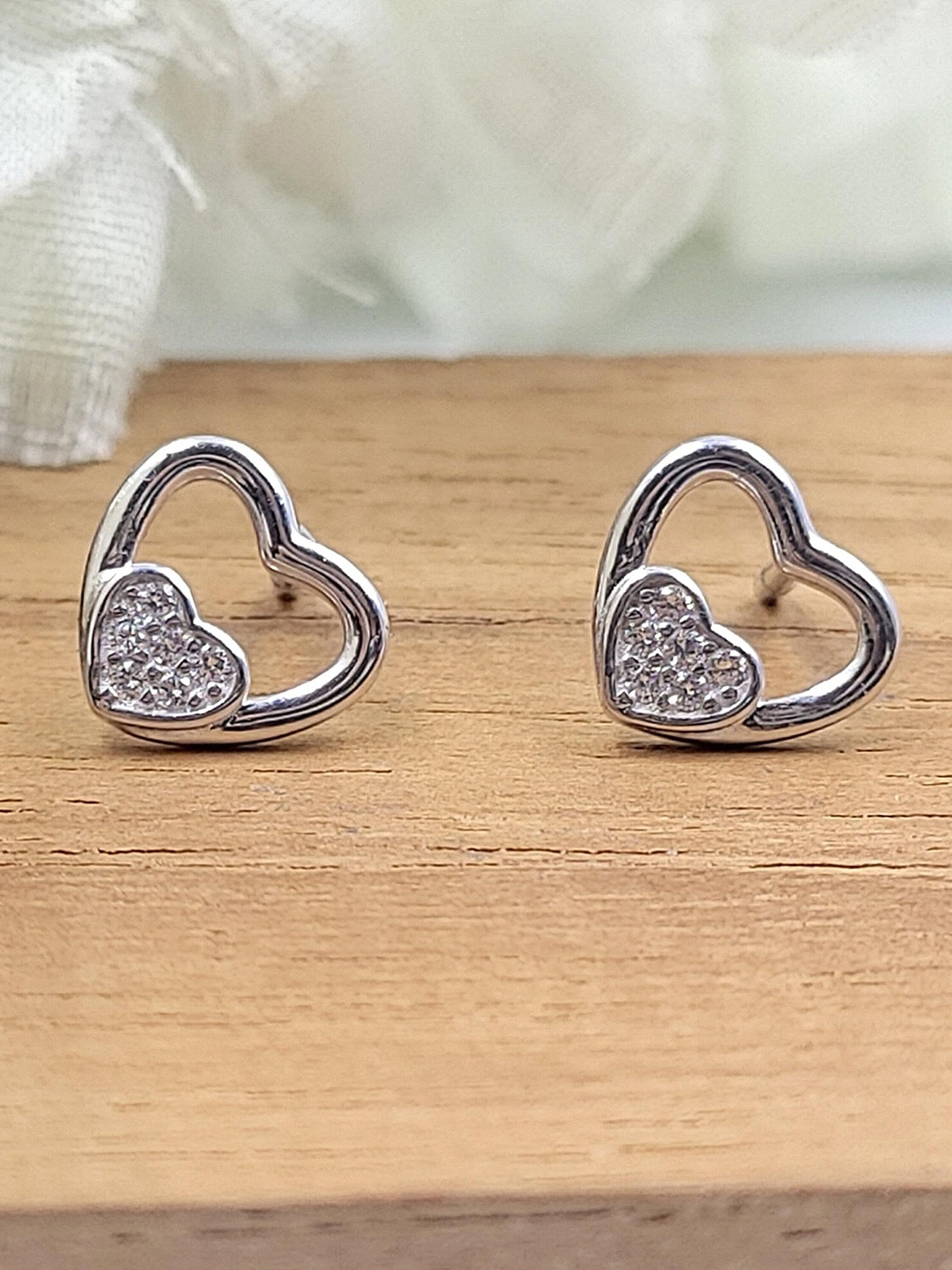 AMONROO 925 Sterling Silver Rhodium-Plated Cubic Zirconia Studded Heart Shaped Studs
AMONROO 925 Sterling Silver Rhodium-Plated Cubic Zirconia Studded Heart Shaped Studs