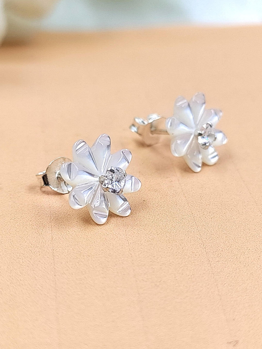 AMONROO 925 Sterling Silver Rhodium-Plated Cubic Zirconia Stones Studded Floral Studs
AMONROO 925 Sterling Silver Rhodium-Plated Cubic Zirconia Stones Studded Floral Studs