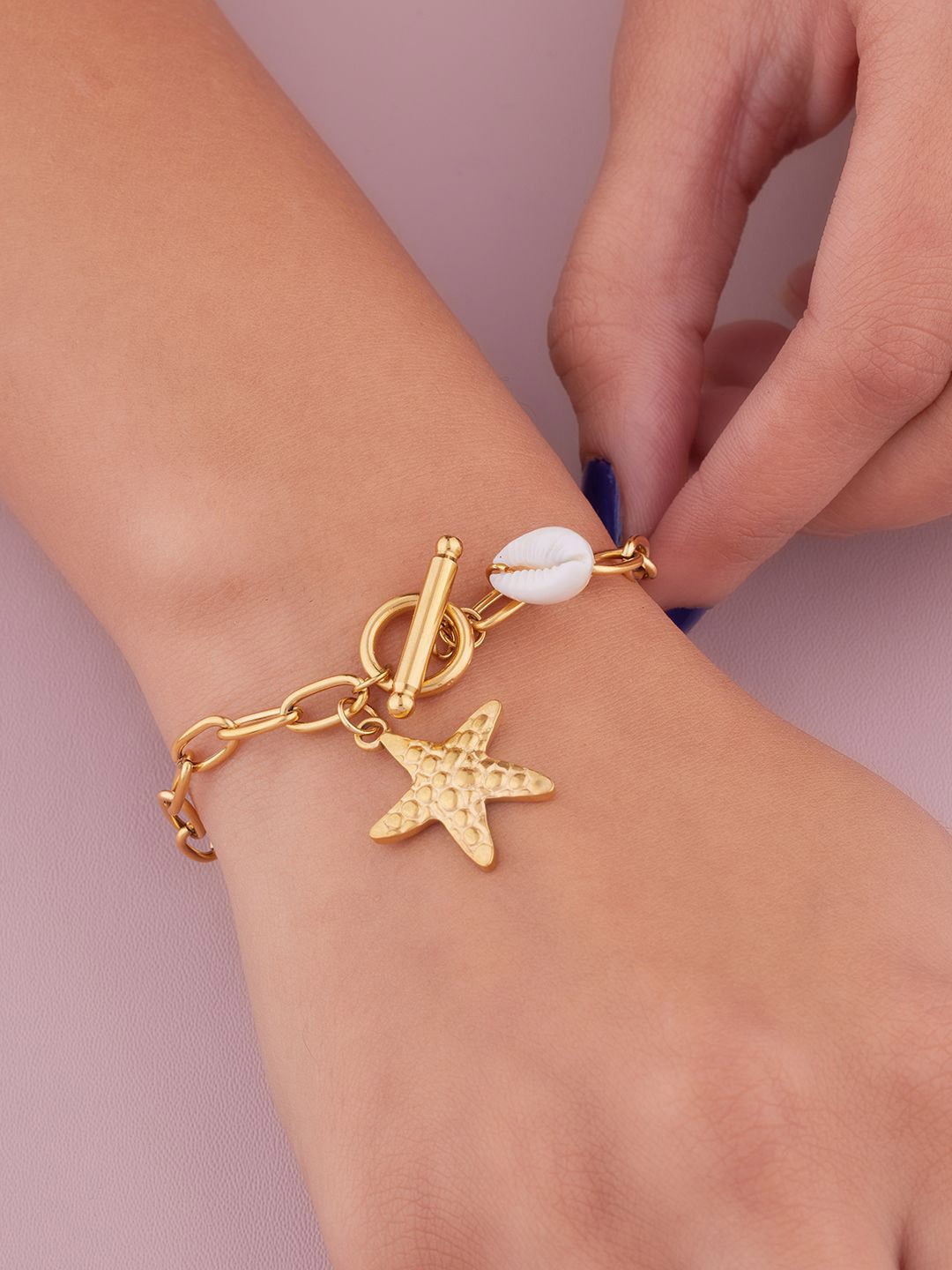 ANJNI CREATION Gold-Plated Pearls Stainless Steel Tarnish-Free Star-Fish Link Bracelet
ANJNI CREATION Gold-Plated Pearls Stainless Steel Tarnish-Free Star-Fish Link Bracelet