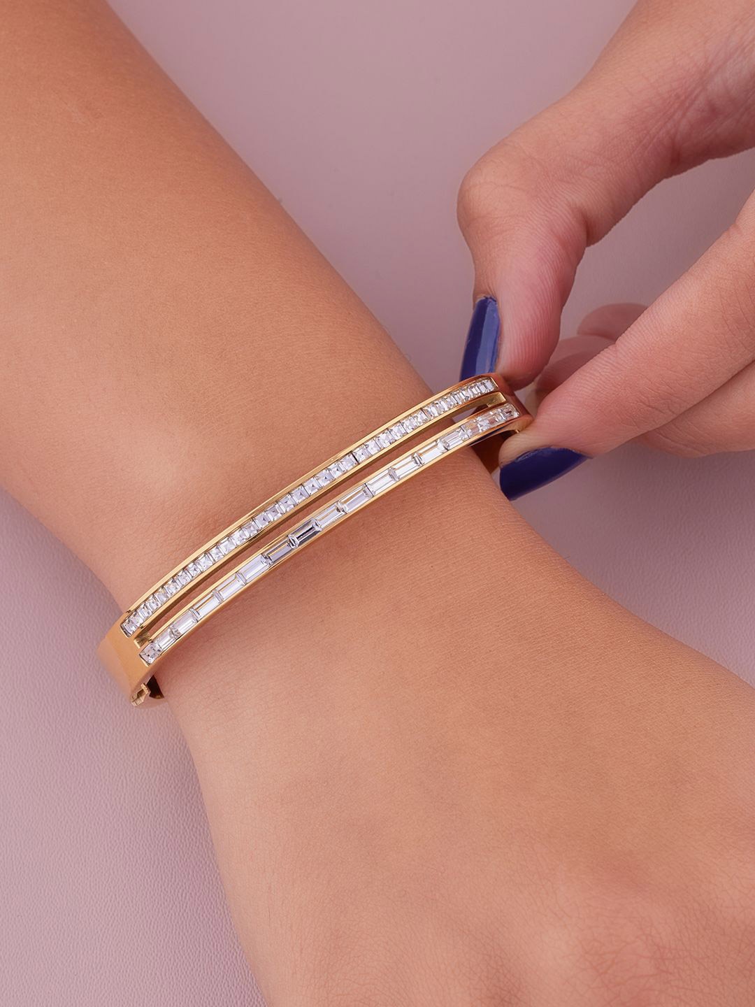 ANJNI CREATION Gold-Plated AD Studded Stainless Steel Tarnish-Free Stake Kada Bracelet
ANJNI CREATION Gold-Plated AD Studded Stainless Steel Tarnish-Free Stake Kada Bracelet
