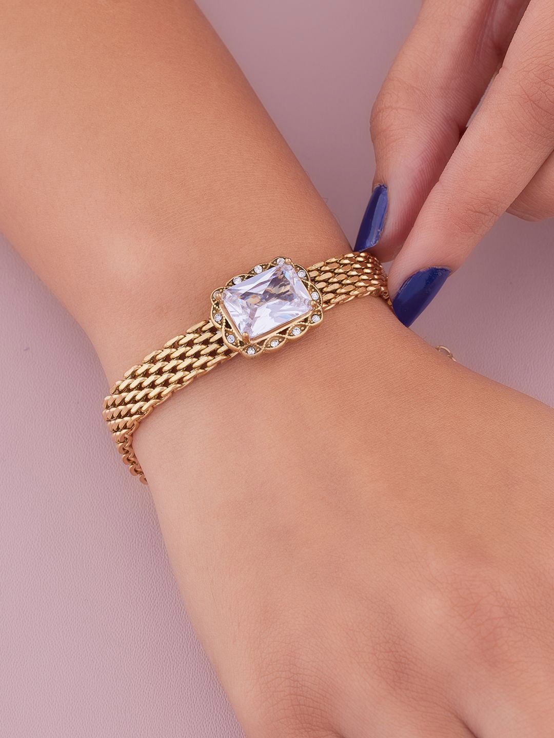 ANJNI CREATION Gold-Plated CZ Studded Stainless Steel Tarnish-Free Belt-Style Bracelet
ANJNI CREATION Gold-Plated CZ Studded Stainless Steel Tarnish-Free Belt-Style Bracelet
