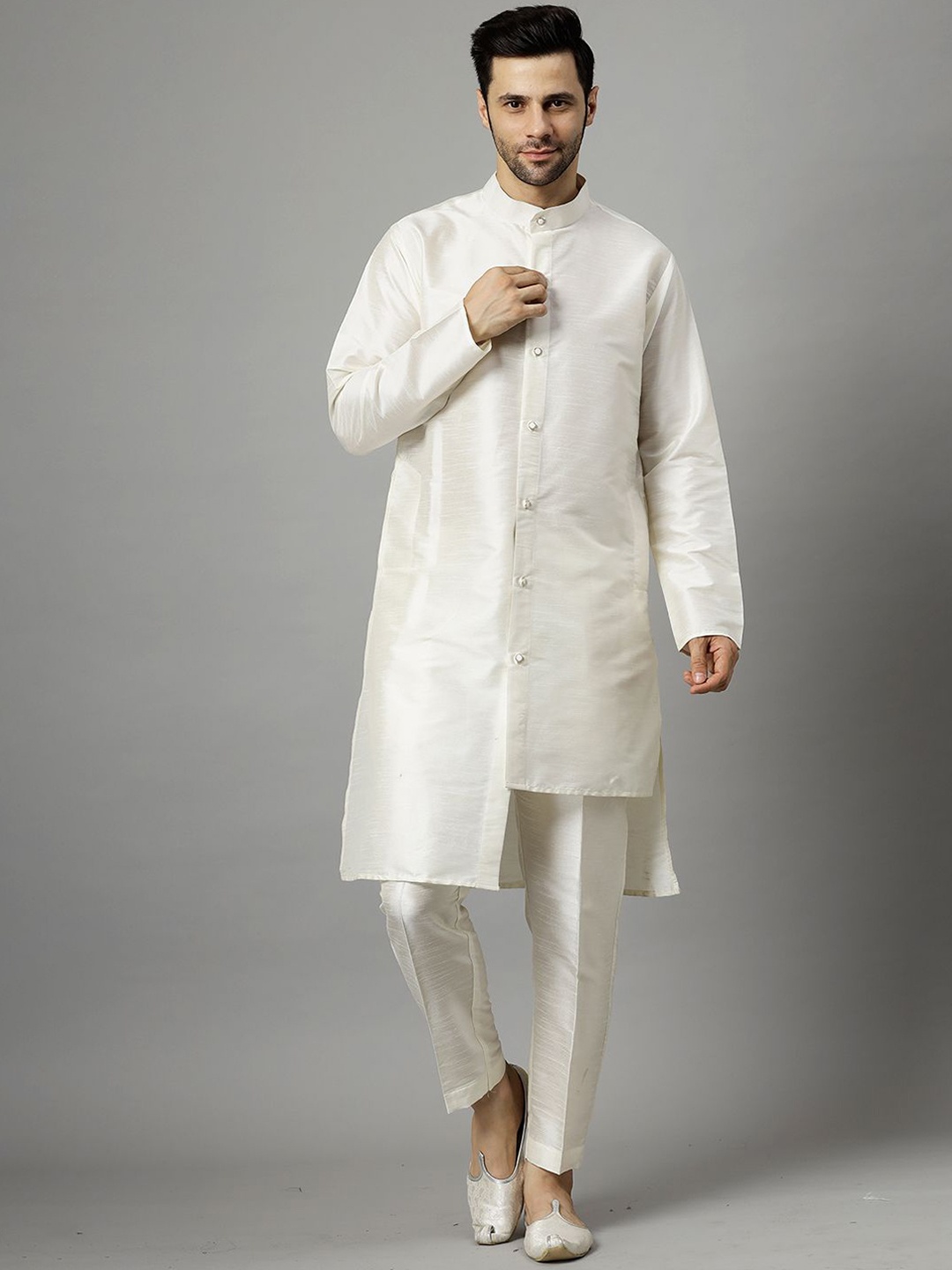 Utsav Fashion Mandarian Collar Tiered Raw Silk High-Low Kurta with Trousers, Off white
Utsav Fashion Mandarian Collar Tiered Raw Silk High-Low Kurta with Trousers, Off white