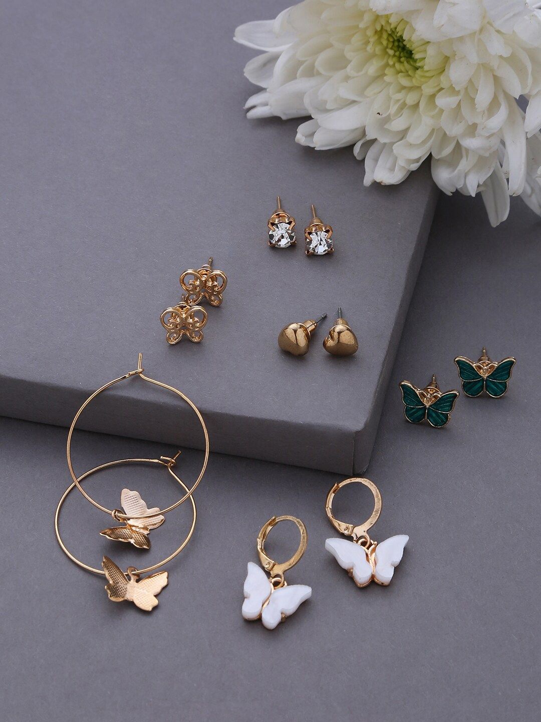 DressBerry Set Of 6 Stainless Steel Gold-Plated Stones Studded Circular Shaped Studs
DressBerry Set Of 6 Stainless Steel Gold-Plated Stones Studded Circular Shaped Studs