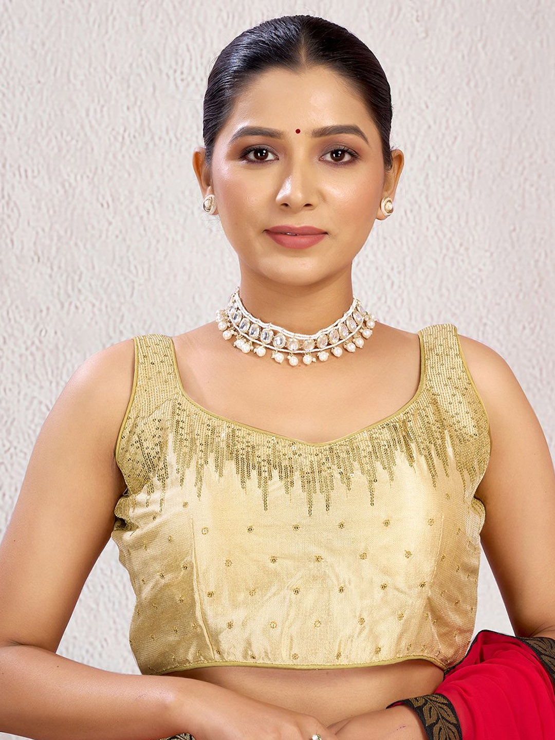 KALINI Embroidered Sequinned Padded Sleeveless Saree Blouse With Tie Up Details, Beige
KALINI Embroidered Sequinned Padded Sleeveless Saree Blouse With Tie Up Details, Beige