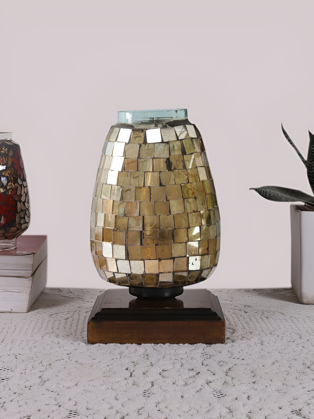 Devansh Gold-Toned & Brown Textured Abstract Shaped Glass Table Lamp With Wooden Base
Devansh Gold-Toned & Brown Textured Abstract Shaped Glass Table Lamp With Wooden Base