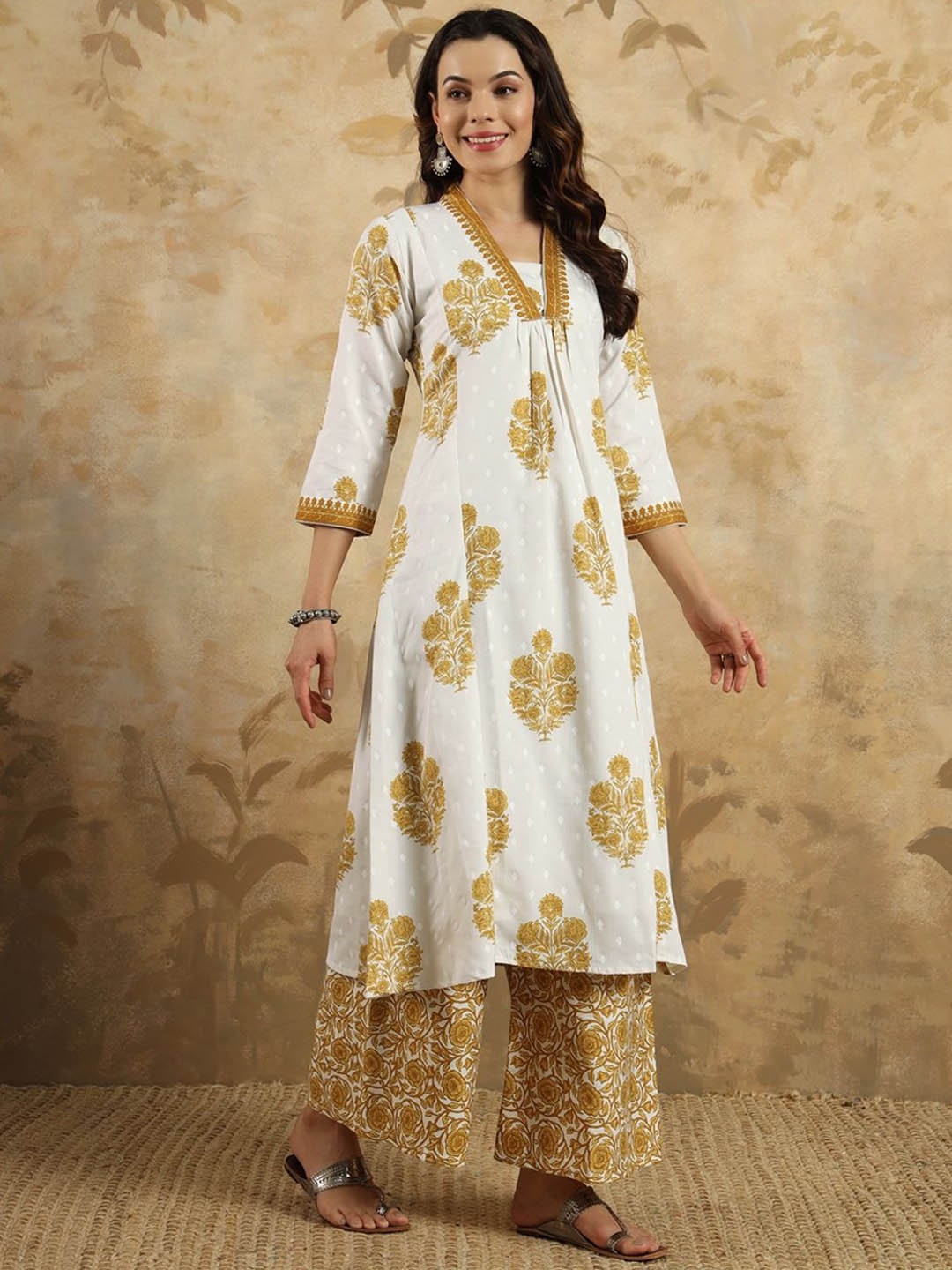 Shatanuvart Export Floral Printed V-Neck Panelled A-line Kurta With Palazzo & Dupatta, Mustard
Shatanuvart Export Floral Printed V-Neck Panelled A-line Kurta With Palazzo & Dupatta, Mustard