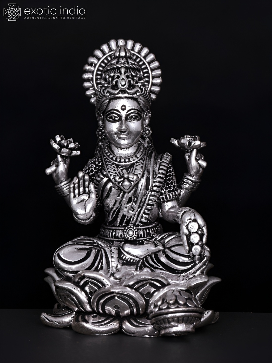 Exotic India Silver-Toned Silver-Plated Brass Goddess Lakshmi Religious Idol Showpiece
Exotic India Silver-Toned Silver-Plated Brass Goddess Lakshmi Religious Idol Showpiece