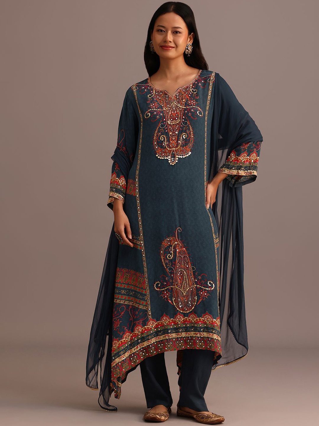 KALKI Fashion Paisley Printed Sequnnied Notch Neck A-Line Kurta with Trousers And Dupatta, Teal
KALKI Fashion Paisley Printed Sequnnied Notch Neck A-Line Kurta with Trousers And Dupatta, Teal