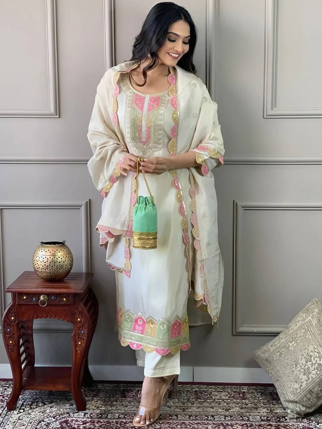 KALINI Women Floral Embroidered Sequinned Round Neck Kurta with Trousers & Dupatta, Off white
KALINI Women Floral Embroidered Sequinned Round Neck Kurta with Trousers & Dupatta, Off white