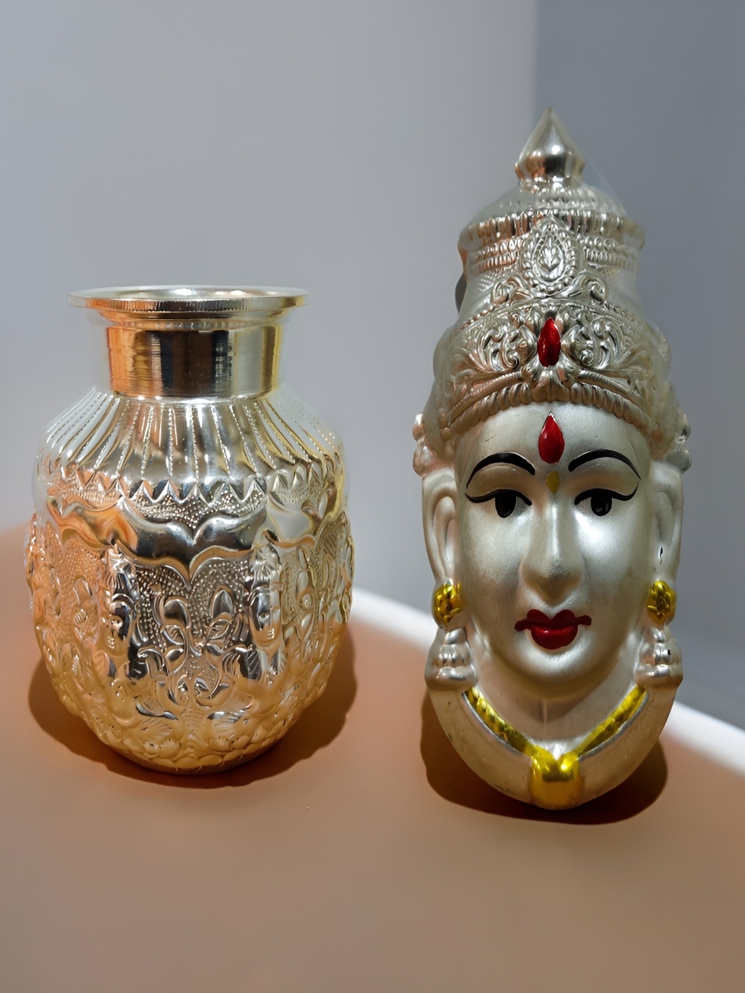 Sigaram Pooja Articles Silver-Toned 2 Pieces German Silver Kalash & Lakshmi Face Mukoota
Sigaram Pooja Articles Silver-Toned 2 Pieces German Silver Kalash & Lakshmi Face Mukoota