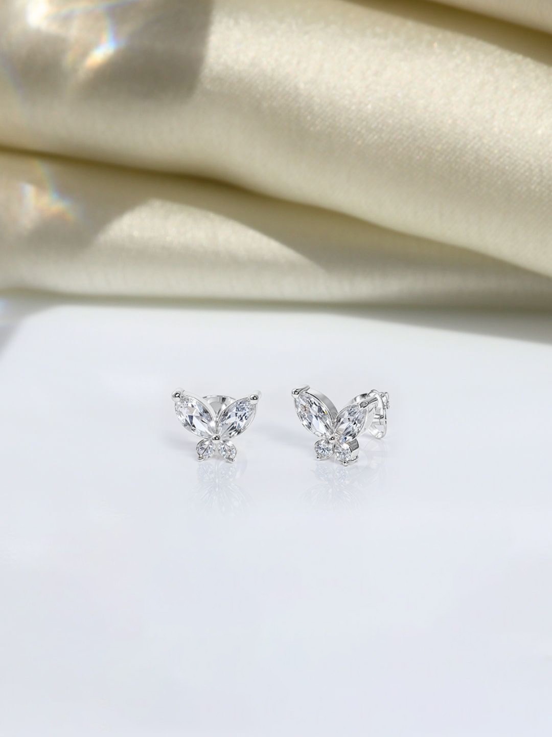 HighSpark Sterling Silver Zircon Stone Studded Contemporary Shaped Studs
HighSpark Sterling Silver Zircon Stone Studded Contemporary Shaped Studs
