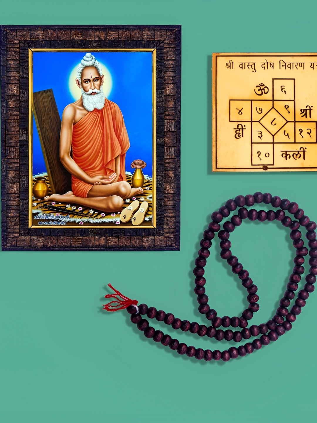 Hawai Brown & Gold Toned 3 Pieces Wooden Photo Frame & Red Chandan Mala With Ashtadhatu
Hawai Brown & Gold Toned 3 Pieces Wooden Photo Frame & Red Chandan Mala With Ashtadhatu