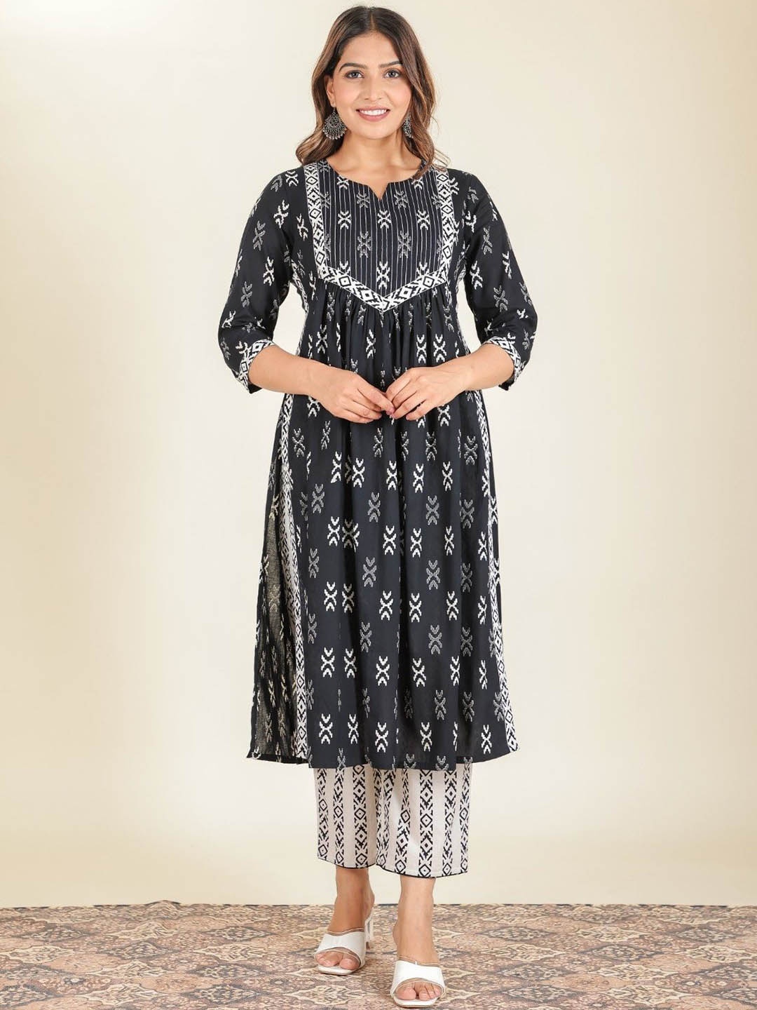 Aramya Geometric Printed Notch Neck Pleated Cotton A-Line Kurta With Trousers, Black
Aramya Geometric Printed Notch Neck Pleated Cotton A-Line Kurta With Trousers, Black