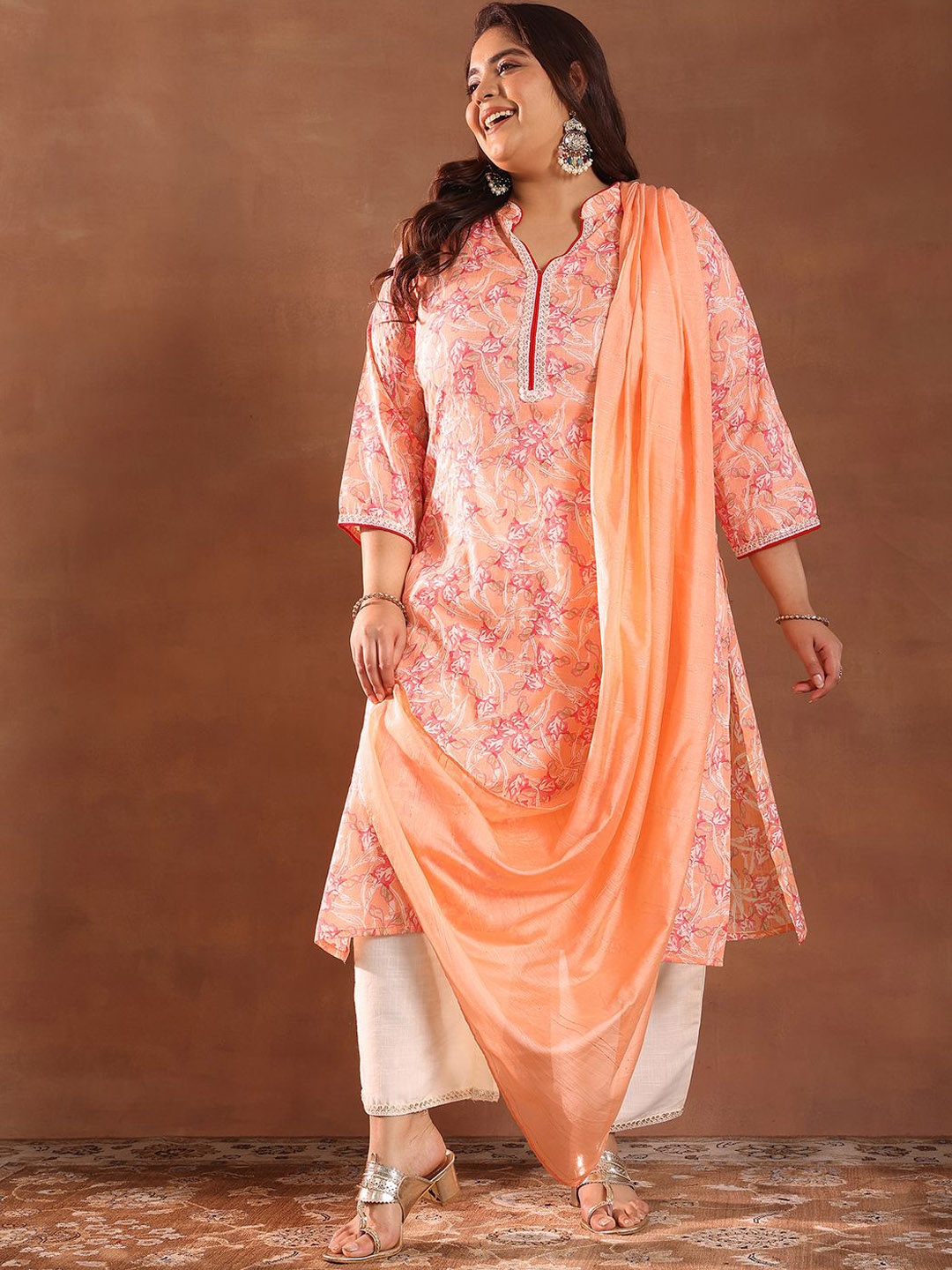 EXTRA LOVE BY LIBAS Plus Size Floral Printed Sequinned Kurta With Trousers & Dupatta, Orange
EXTRA LOVE BY LIBAS Plus Size Floral Printed Sequinned Kurta With Trousers & Dupatta, Orange