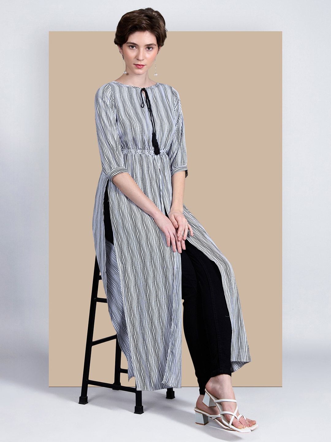 Chemistry Women Round Neck Striped Tassel Tie-Up Detailing Maxi Work wear Top, Black
Chemistry Women Round Neck Striped Tassel Tie-Up Detailing Maxi Work wear Top, Black