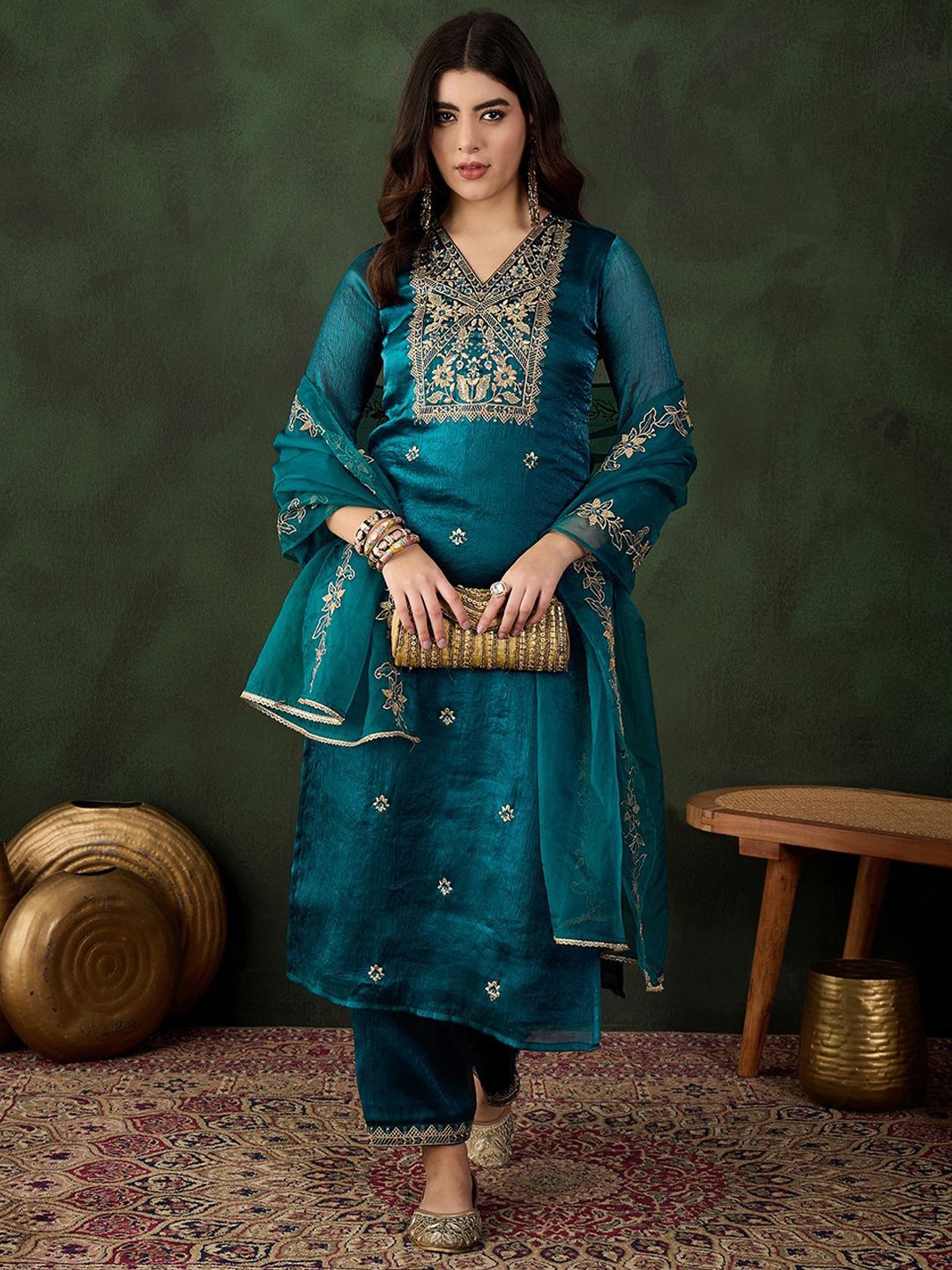 Sangria Teal Floral Embroidered V-Neck Zari Straight Kurta With Trousers And Dupatta
Sangria Teal Floral Embroidered V-Neck Zari Straight Kurta With Trousers And Dupatta