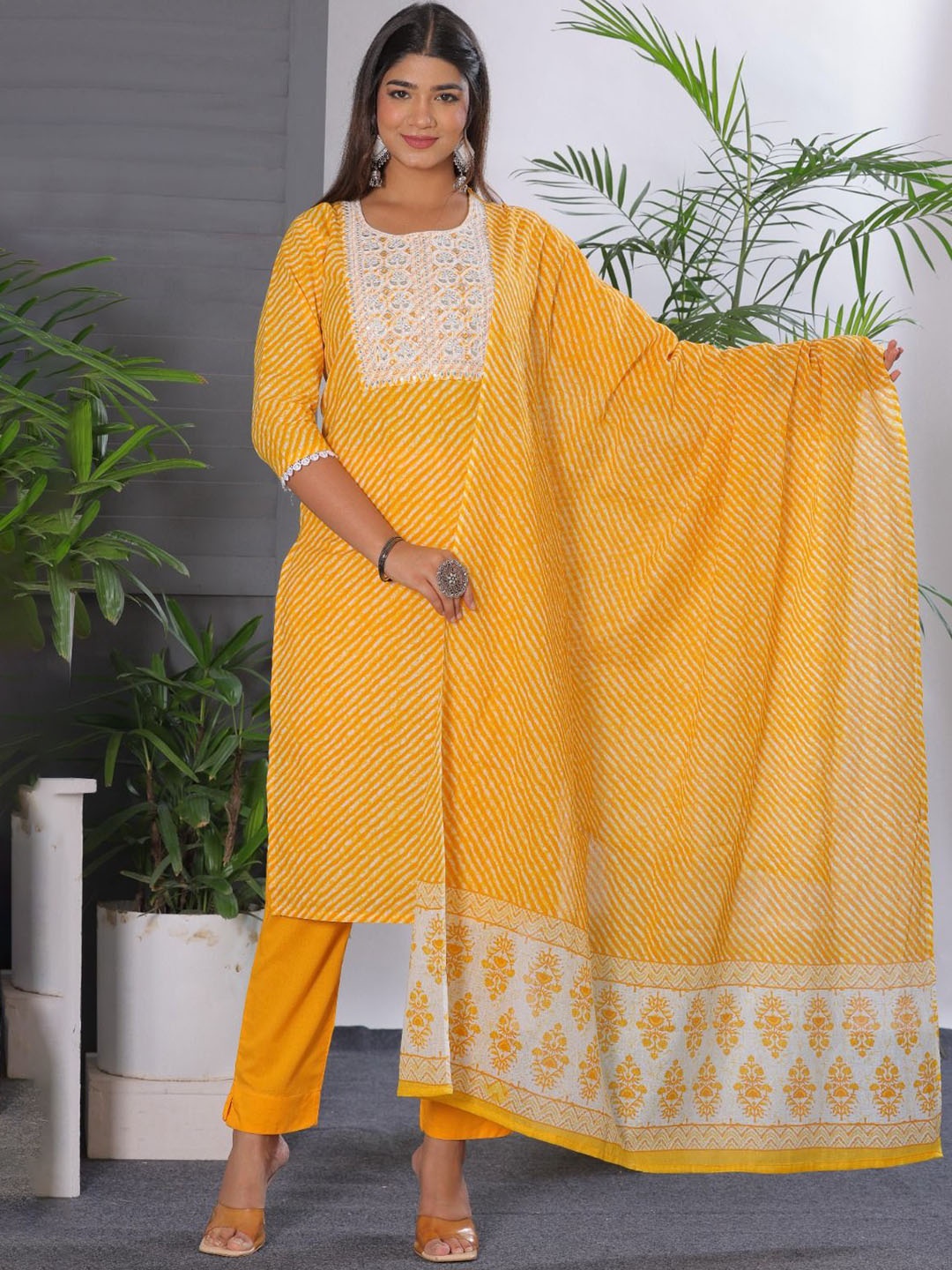 KALINI Women Leheriya Embroidered Regular Mirror Work Pure Cotton Kurta with Trousers & With Dupatta, Yellow
KALINI Women Leheriya Embroidered Regular Mirror Work Pure Cotton Kurta with Trousers & With Dupatta, Yellow