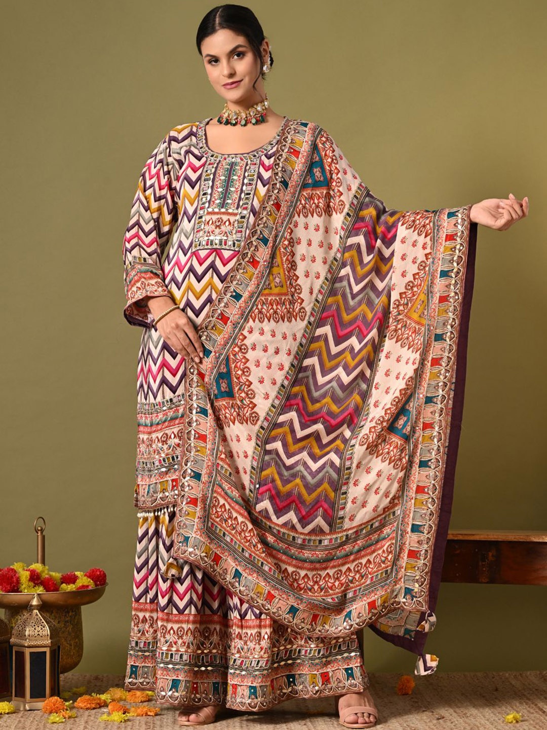 ZARIKALI Chevron Printed Mirror Work Scoop Neck Straight Kurta With Sharara And Dupatta, Purple
ZARIKALI Chevron Printed Mirror Work Scoop Neck Straight Kurta With Sharara And Dupatta, Purple