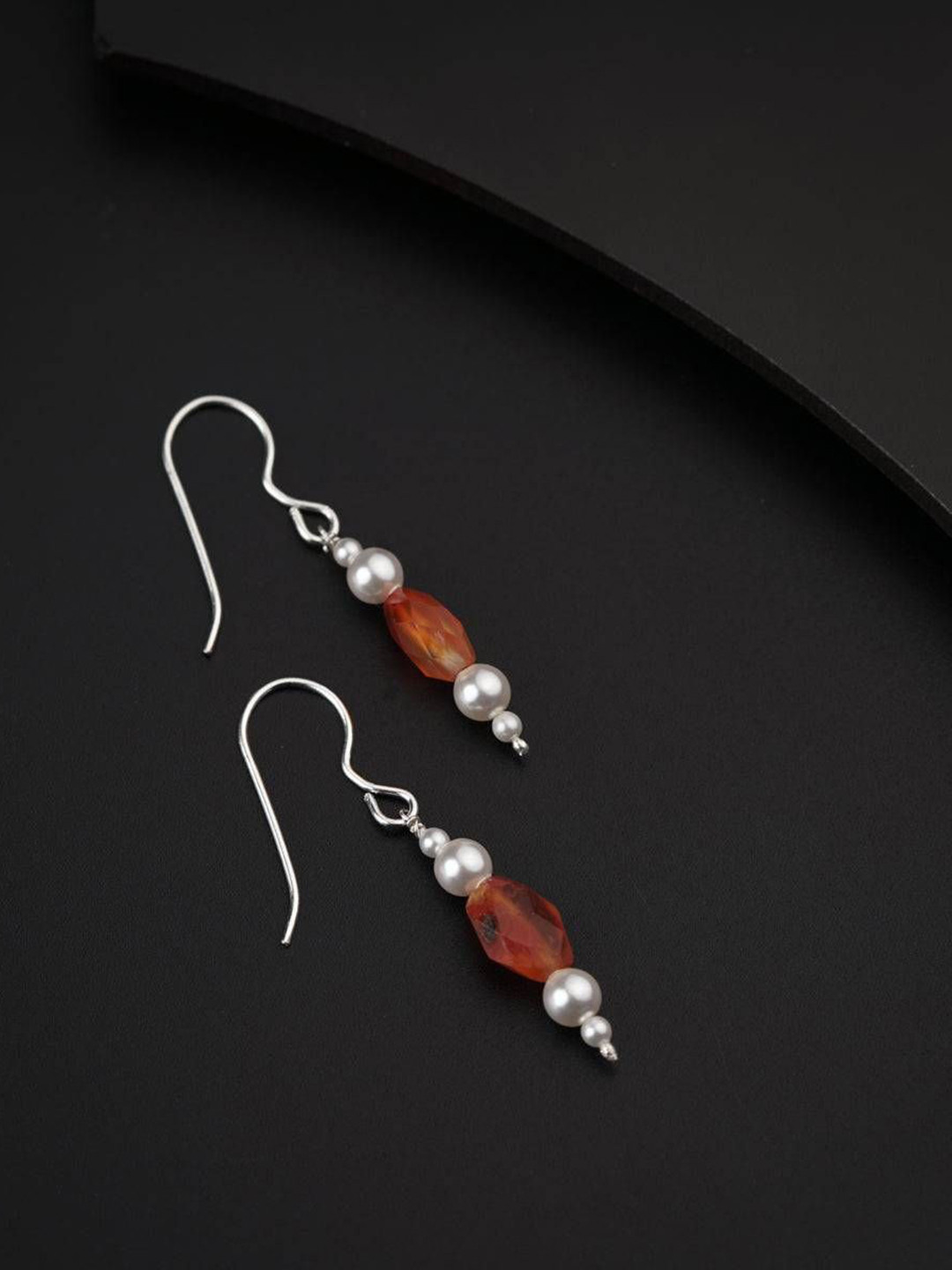 House of Aadyaa 925 Sterling Silver Carnelian and Pearls Studded Oxidised Drop Earrings
House of Aadyaa 925 Sterling Silver Carnelian and Pearls Studded Oxidised Drop Earrings
