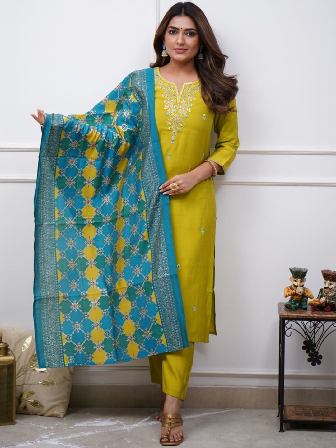 KALINI Floral Embroidered Notch Neck Chanderi Silk Straight Kurta With Trousers & Dupatta, Yellow
KALINI Floral Embroidered Notch Neck Chanderi Silk Straight Kurta With Trousers & Dupatta, Yellow