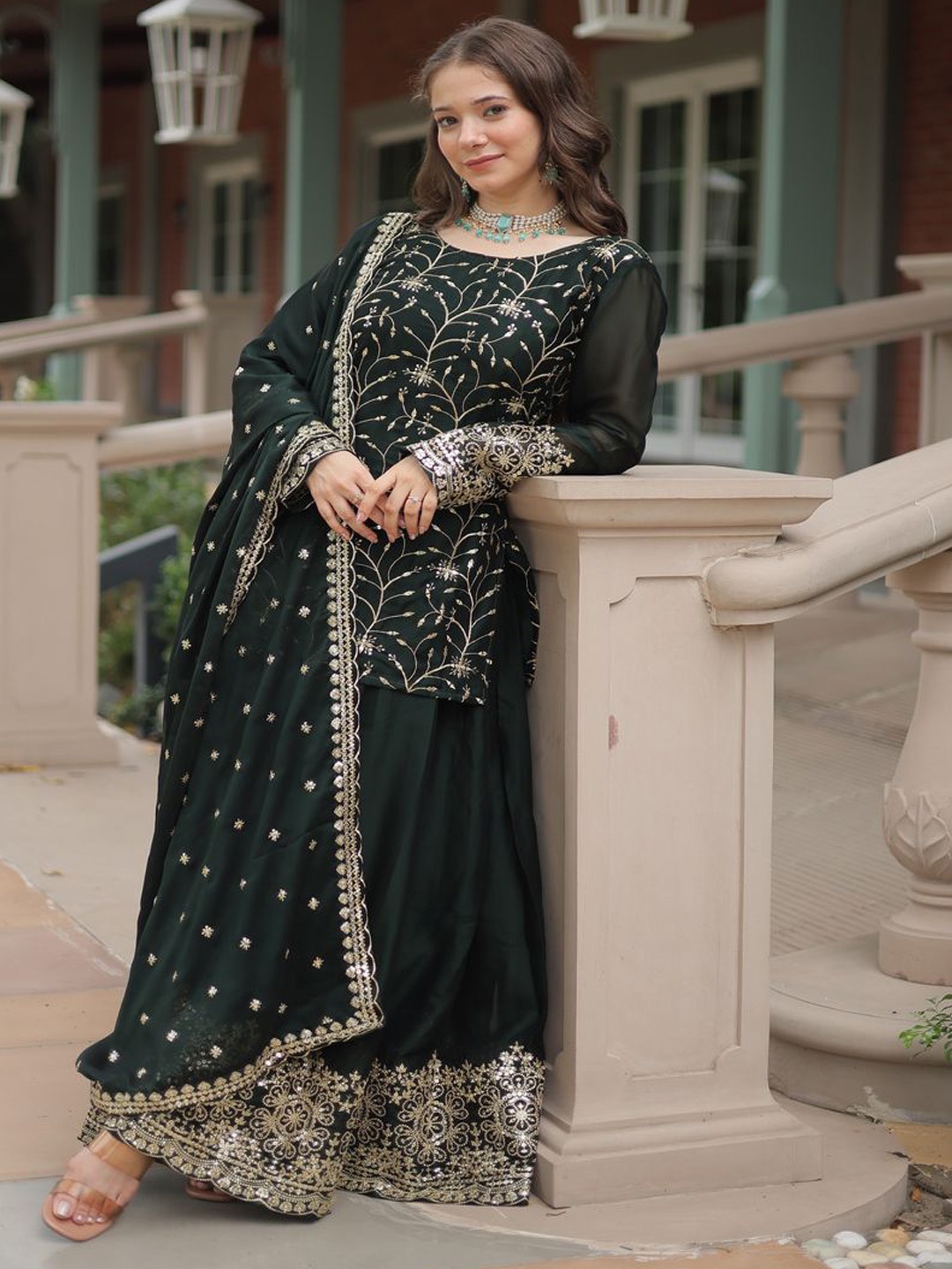 KALINI Floral Embroidered Mirror Work Boat Neck Straight Kurta with Sharara And Dupatta, Green
KALINI Floral Embroidered Mirror Work Boat Neck Straight Kurta with Sharara And Dupatta, Green