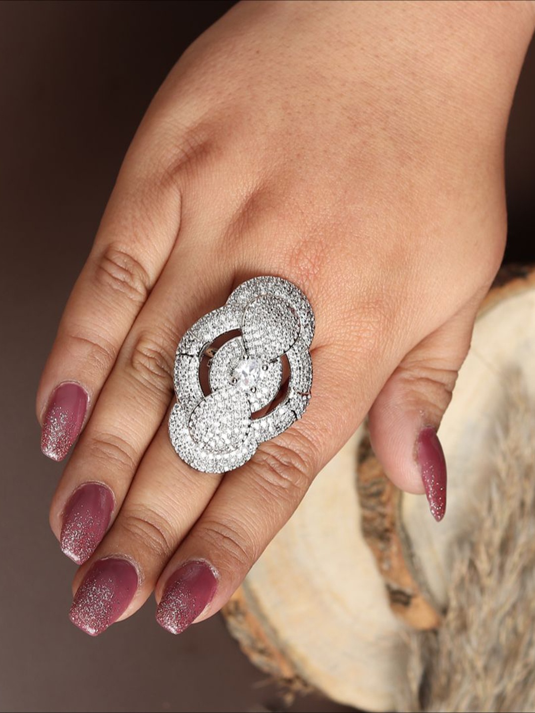 RHOSYN Silver-Plated Cubic Zirconia & American Diamond Studded Adjustable Finger Ring
RHOSYN Silver-Plated Cubic Zirconia & American Diamond Studded Adjustable Finger Ring