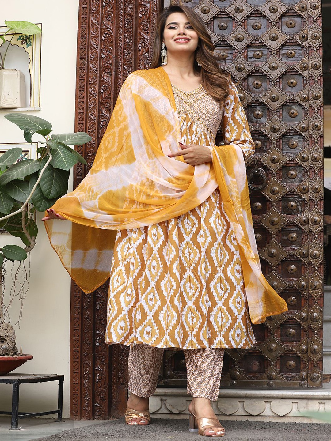 JD FINISHING Geometric Printed V-Neck Empire Anarkali Kurta With Trousers & Dupatta, Mustard
JD FINISHING Geometric Printed V-Neck Empire Anarkali Kurta With Trousers & Dupatta, Mustard