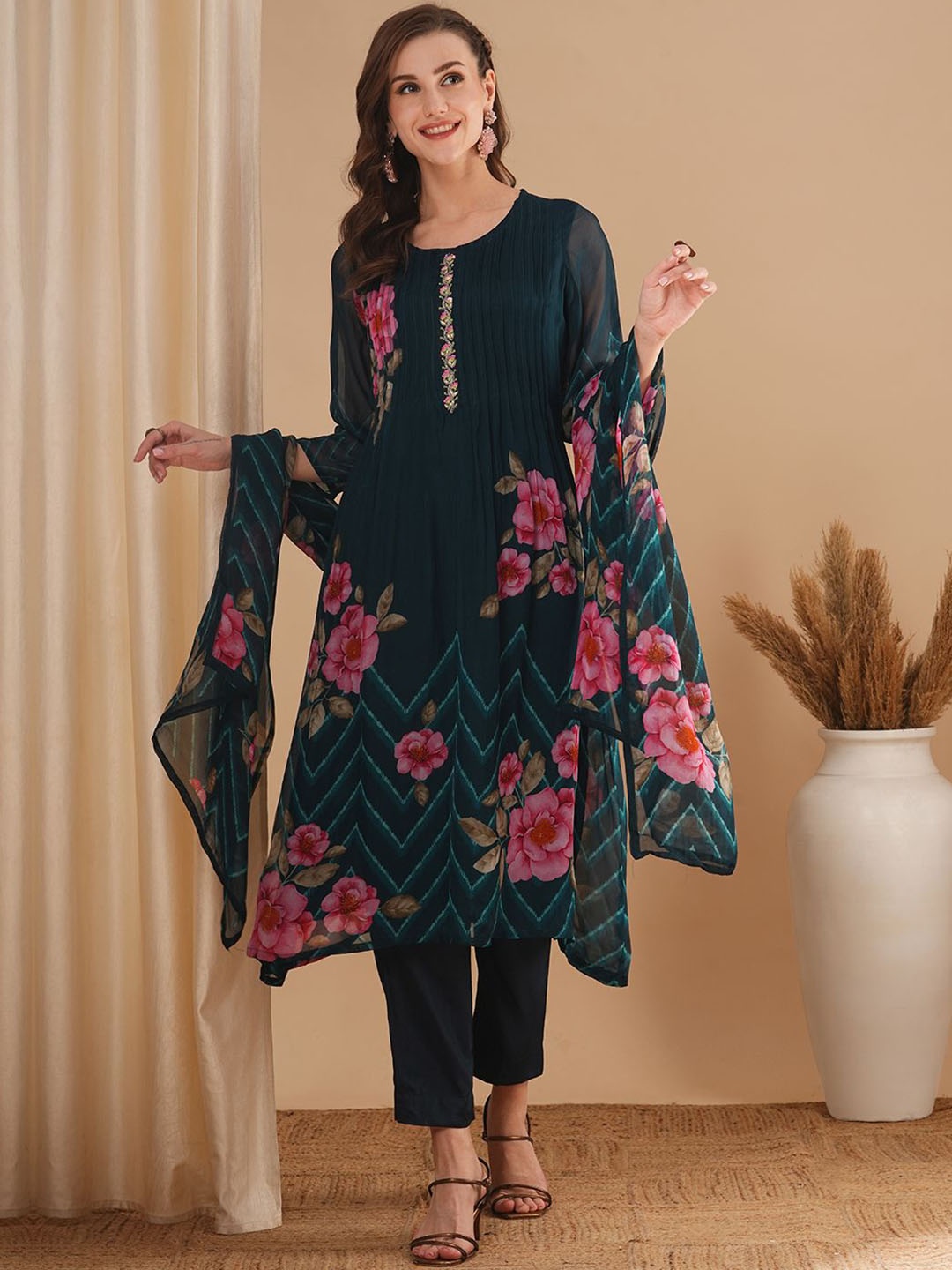 FASHOR Teal Blue Floral Printed Round Neck Pleated A-Line Kurta With Trousers & Dupatta
FASHOR Teal Blue Floral Printed Round Neck Pleated A-Line Kurta With Trousers & Dupatta