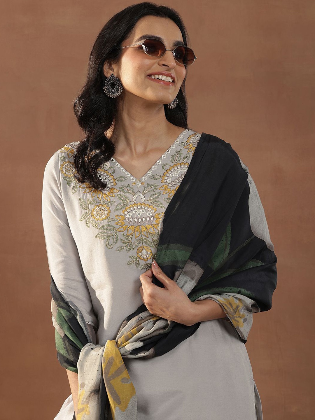 Libas Grey Floral Yoke Design V-Neck Mirror Work Straight Kurta With Trousers And Dupatta
Libas Grey Floral Yoke Design V-Neck Mirror Work Straight Kurta With Trousers And Dupatta