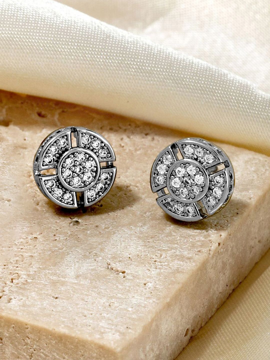 Peora Cubic Zirconia Silver-Plated Artificial Stones Studded Circular Shaped Stud
Peora Cubic Zirconia Silver-Plated Artificial Stones Studded Circular Shaped Stud