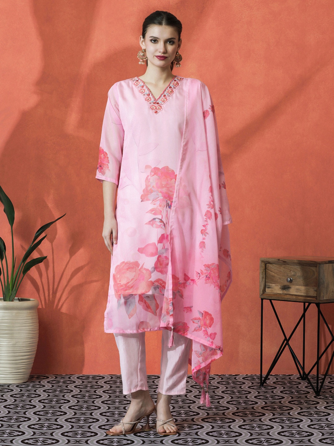 Sangria Pink Floral Printed Beads And Stones V-Neck Kurta With Trouser And Dupatta
Sangria Pink Floral Printed Beads And Stones V-Neck Kurta With Trouser And Dupatta