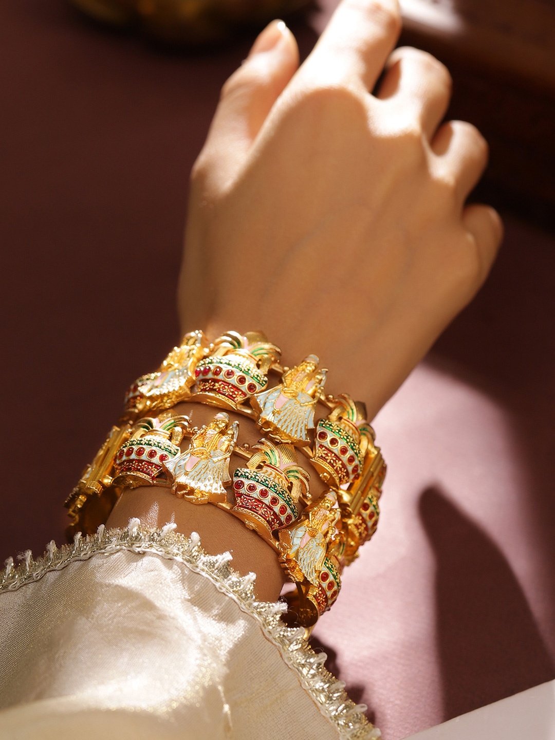 Rubans Set of 2 22K Gold Plated Handcrafted Bridal Bangles with Multicolor Enamel Work
Rubans Set of 2 22K Gold Plated Handcrafted Bridal Bangles with Multicolor Enamel Work