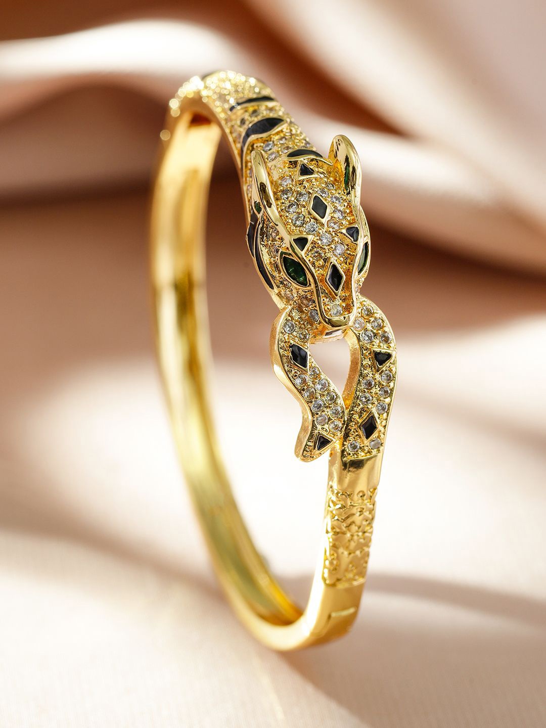Rubans 22K Gold Plated Demi Fine Panther Design Bracelet with Green & Black Cubic Zirconia
Rubans 22K Gold Plated Demi Fine Panther Design Bracelet with Green & Black Cubic Zirconia