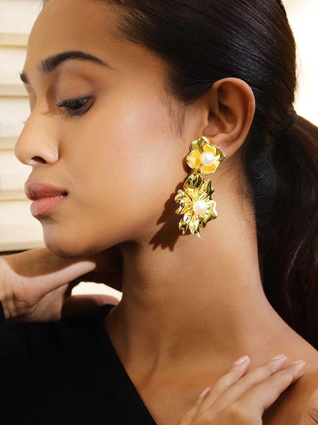 Rubans Voguish 18K Gold Plated Bold Pearl Studded Big Floral Drop Statement Earrings
Rubans Voguish 18K Gold Plated Bold Pearl Studded Big Floral Drop Statement Earrings