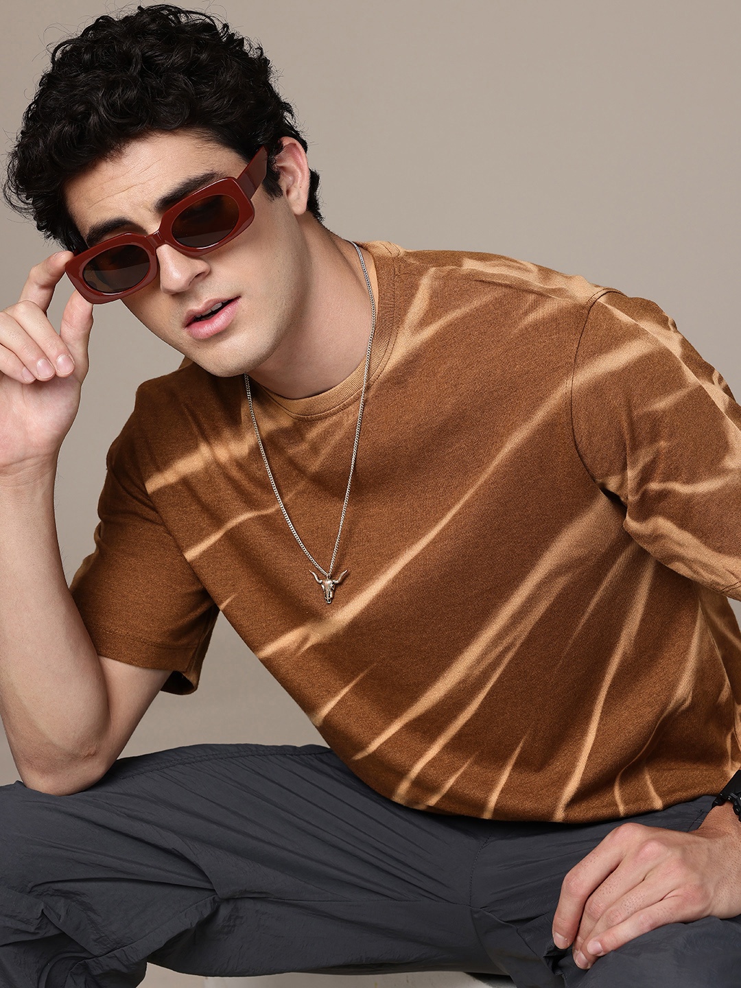 R.Code by The Roadster Life Co. Men Tie and Dye Printed Relaxed Fit T-shirt, Brown
R.Code by The Roadster Life Co. Men Tie and Dye Printed Relaxed Fit T-shirt, Brown