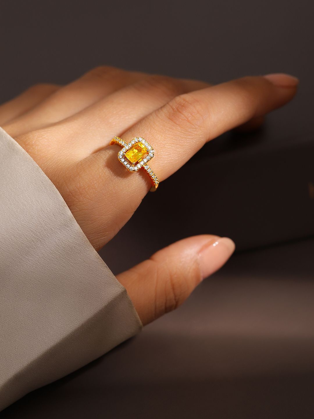 Rubans 18K Gold Plated Yellow Sapphire Emerald Cut Cubic Zirconia Studded Adjustable Ring
Rubans 18K Gold Plated Yellow Sapphire Emerald Cut Cubic Zirconia Studded Adjustable Ring