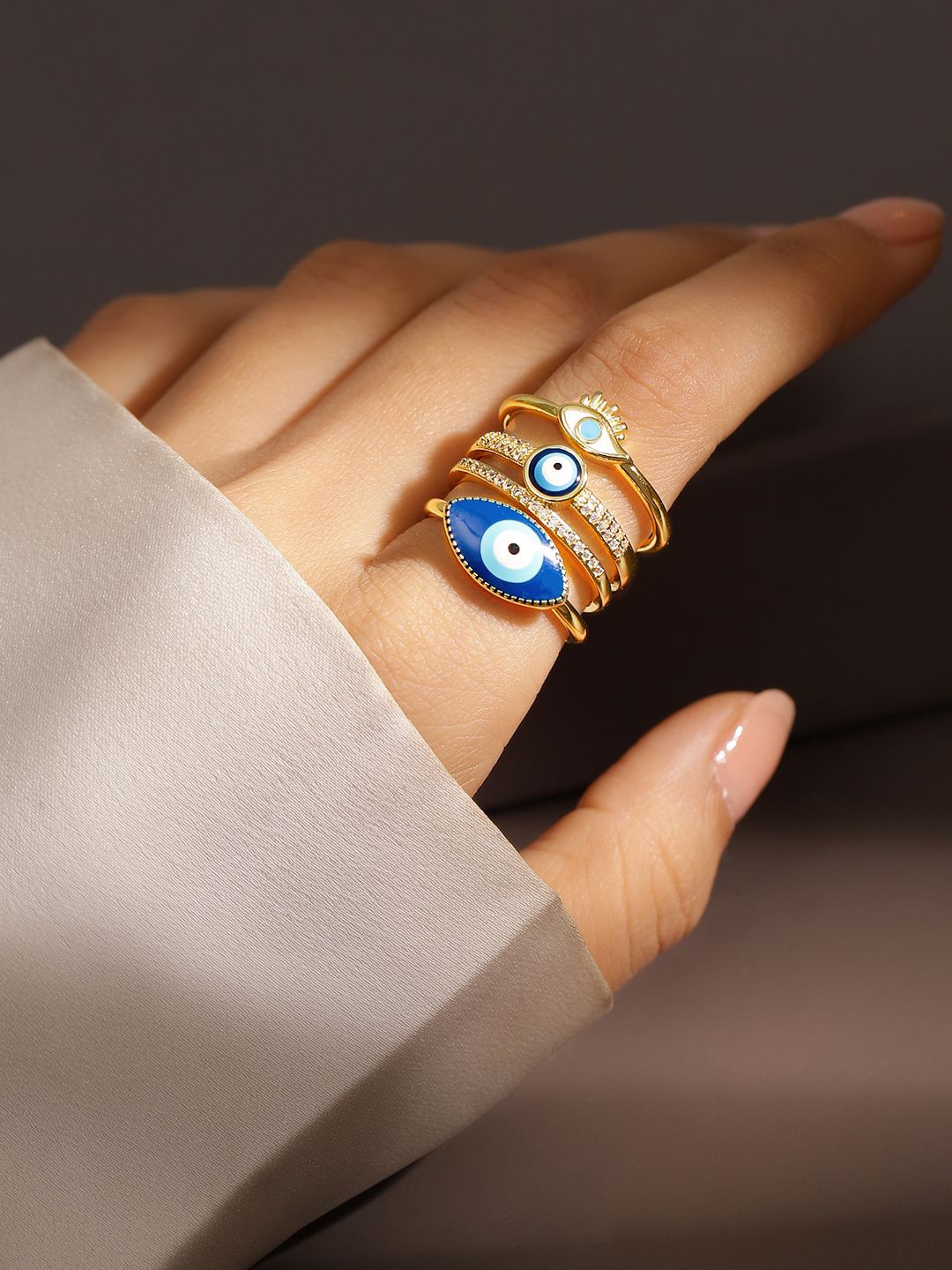 Rubans Set of 3 18K Gold Plated Cubic Zirconia Studded Evil Eye Openable Adjustable Rings
Rubans Set of 3 18K Gold Plated Cubic Zirconia Studded Evil Eye Openable Adjustable Rings