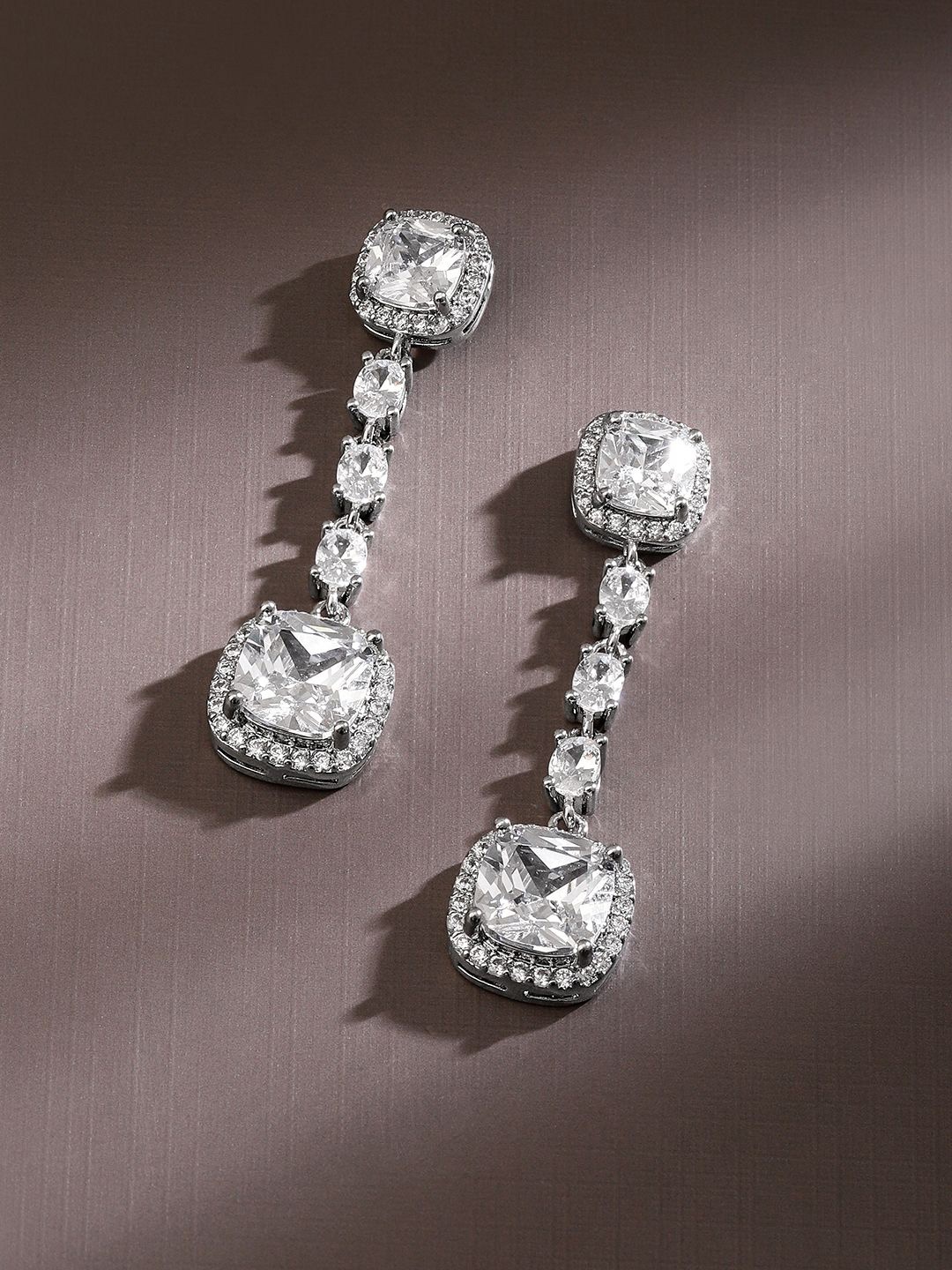 Rubans Rhodium Plated Cushion Cut Cubic Zirconia Studded Drop Earrings Sparkle, Silver
Rubans Rhodium Plated Cushion Cut Cubic Zirconia Studded Drop Earrings Sparkle, Silver