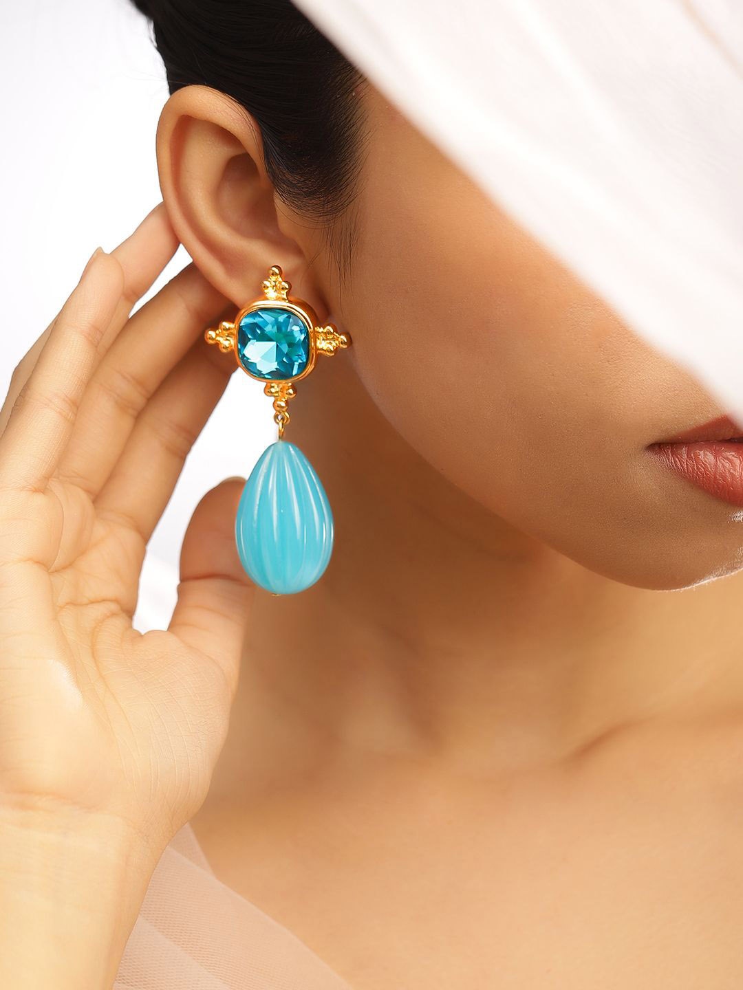Rubans 18K Gold Plated Crystal Blue Sapphire Studded & Aqua Beaded Statement Drop Earrings
Rubans 18K Gold Plated Crystal Blue Sapphire Studded & Aqua Beaded Statement Drop Earrings
