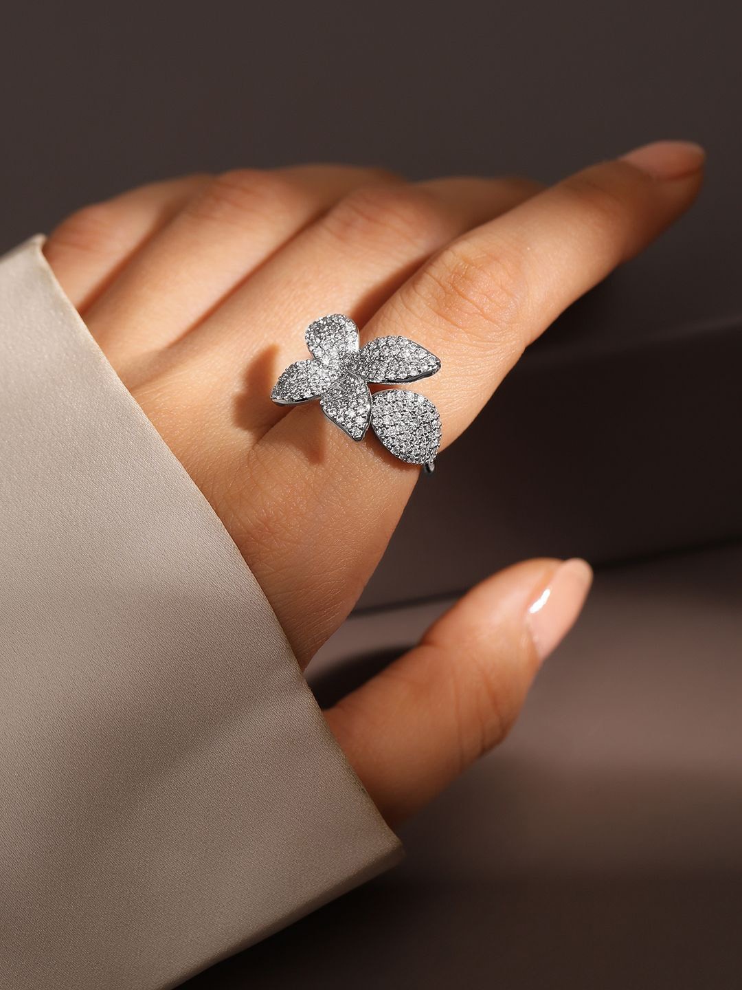 Rubans Rhodium Plated Cubic Zirconia Studded Floral Openable Adjustable Statement Ring, Silver
Rubans Rhodium Plated Cubic Zirconia Studded Floral Openable Adjustable Statement Ring, Silver