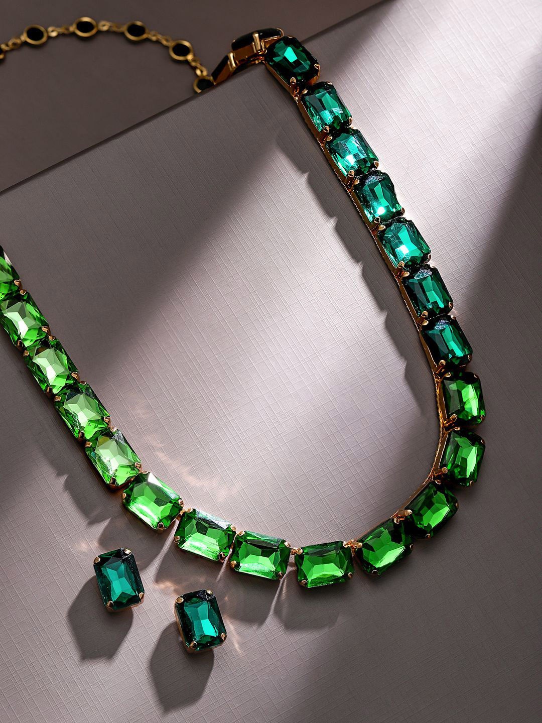 Rubans Voguish 18K Gold Plated Light & Deep Emerald Crystal & Cubic Zirconia Necklace Set
Rubans Voguish 18K Gold Plated Light & Deep Emerald Crystal & Cubic Zirconia Necklace Set